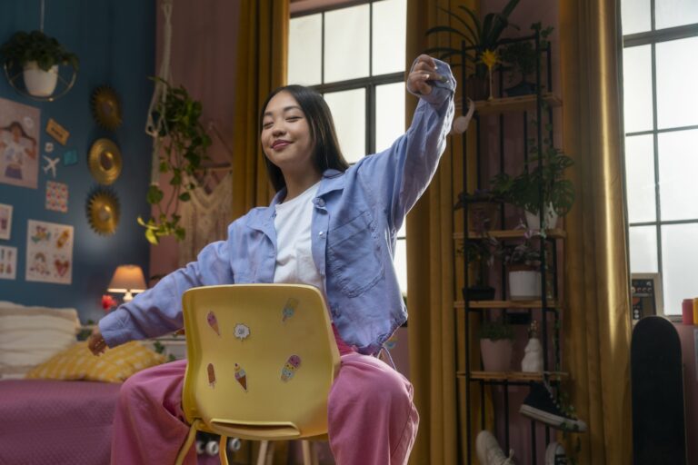 side-view-girl-posing-chair-min